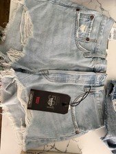 Levi s 501 Women s Denim Shorts Size 26 Blue Cut Off Distressed