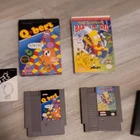 Q*bert Ultra NES w/ Box & Manual, Simpsons Bart vs. World Acclaim NES w/ Box