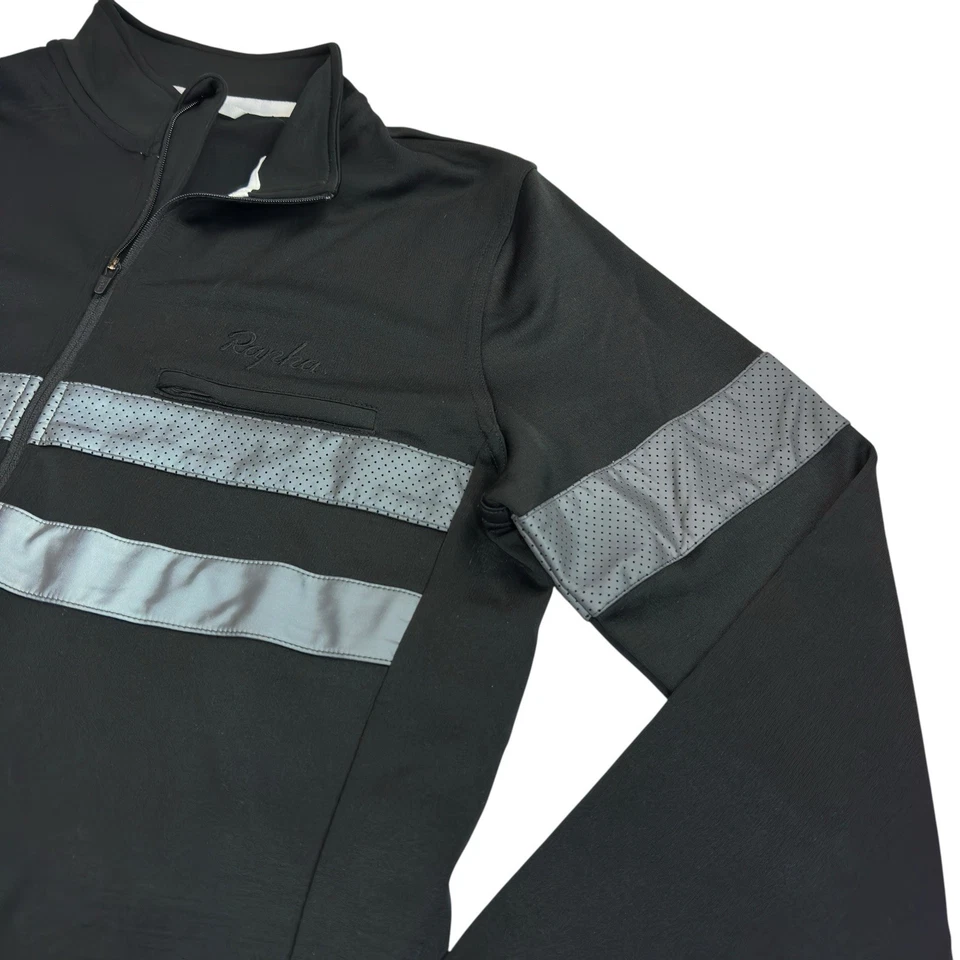 CHAQUETA DE CICLISMO RAPHA NEGRA MANGA LARGA BREVET BLOQUE DE VIENTO GRANDE PARA MUJER HI VIZY Foto 2 de 4