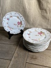 Limoges Haviland. 11 assiettes à pain 16 cm en porcelaine modèle Roses De France