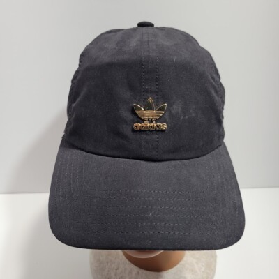black adidas hat with gold logo