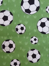  Football fabric UK fat quarter 56cm x 50cm approx 100% cotton balls green bg