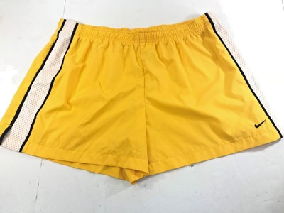 yellow and white nike shorts