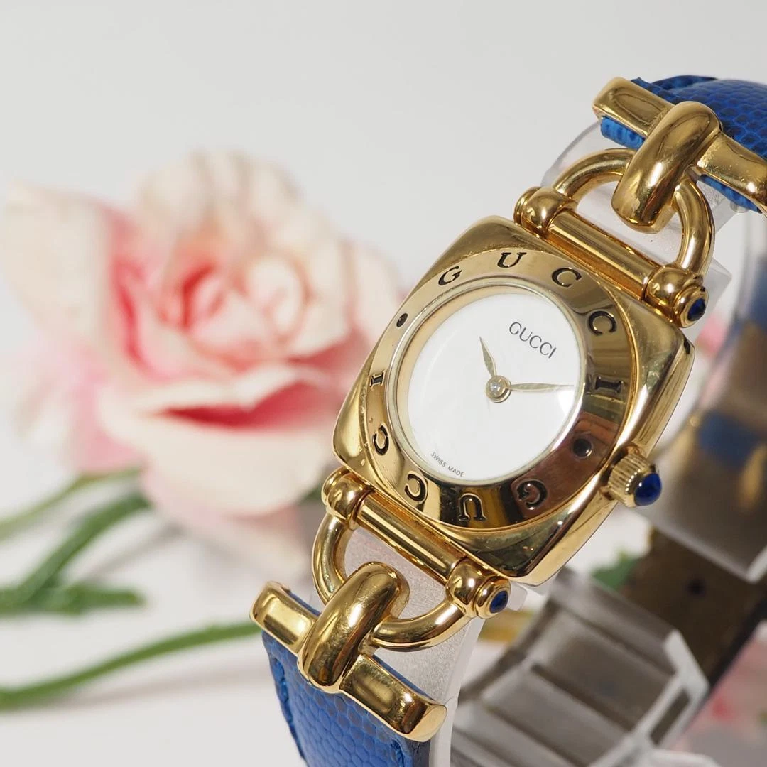 Montre femme Gucci Horsebit ceinture cuir or 876