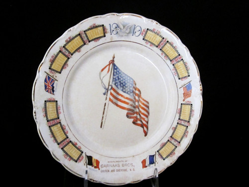1919 World War WWI 9” Calendar Plate Garnaas Bros. Oberon & Sheyenne N.D. Flag