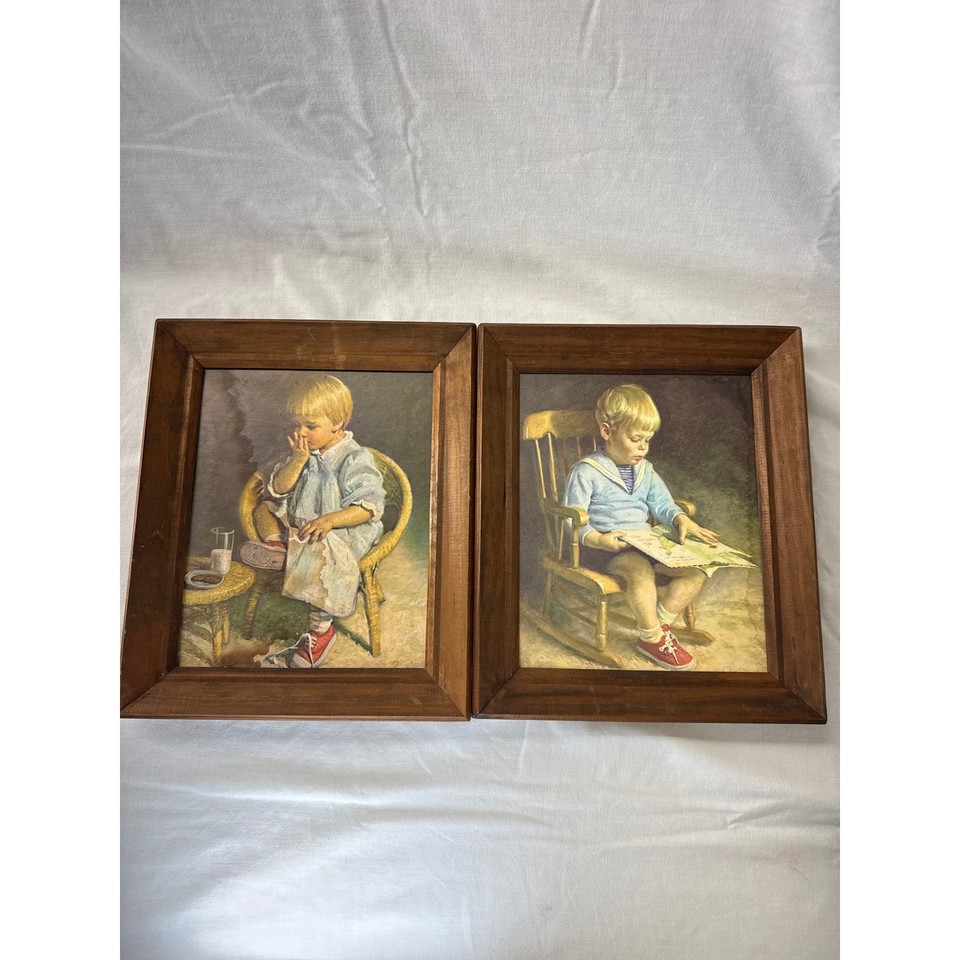 A charming pair of mid-century framed prints featuring a kid in red sneakers reading and snacking — nostalgic, whimsical wall art with instant retro personality.