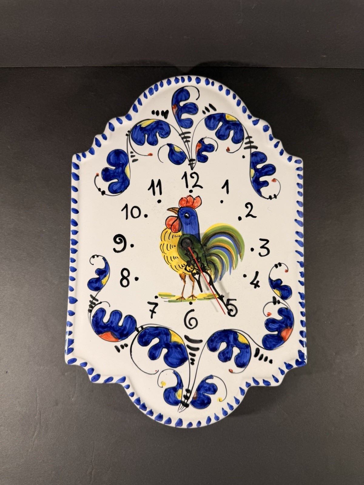 Hand-painted Italian ceramic wall clock featuring a traditional "Orvietano Gallo
