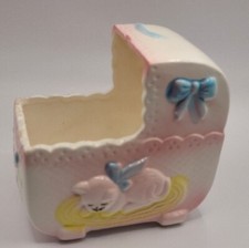 Planter baby ceramic bassinet. Blue ribbon w/ cat on rug. Taiwan. Says For Baby.