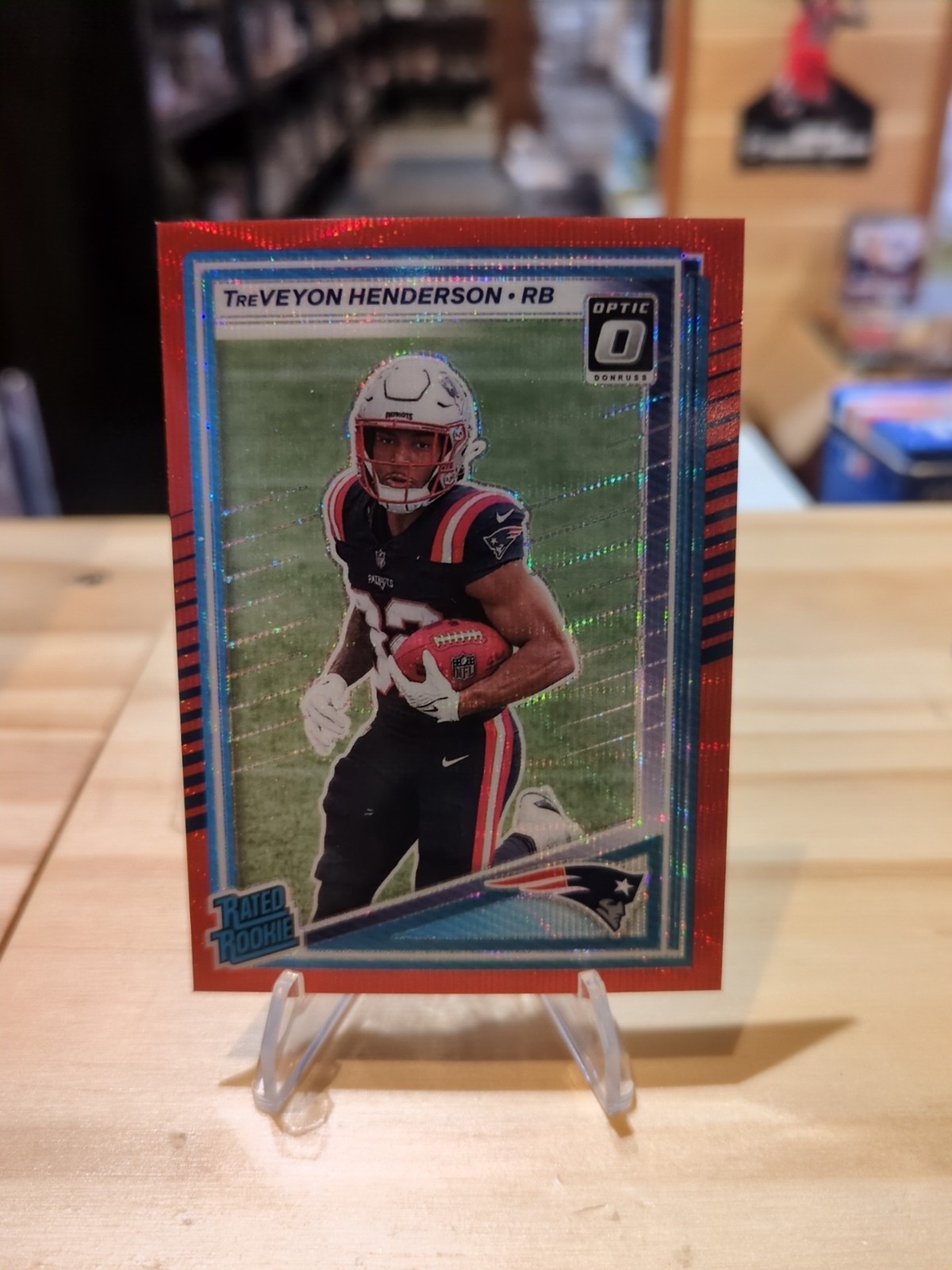 2025 Donruss - Rated Rookie TreVeyon Henderson Optic Preview Red Wave Prizm (RC)