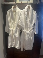 Two luxurious white 100 cotton terry cloth spa robes. One size fits all, Large.