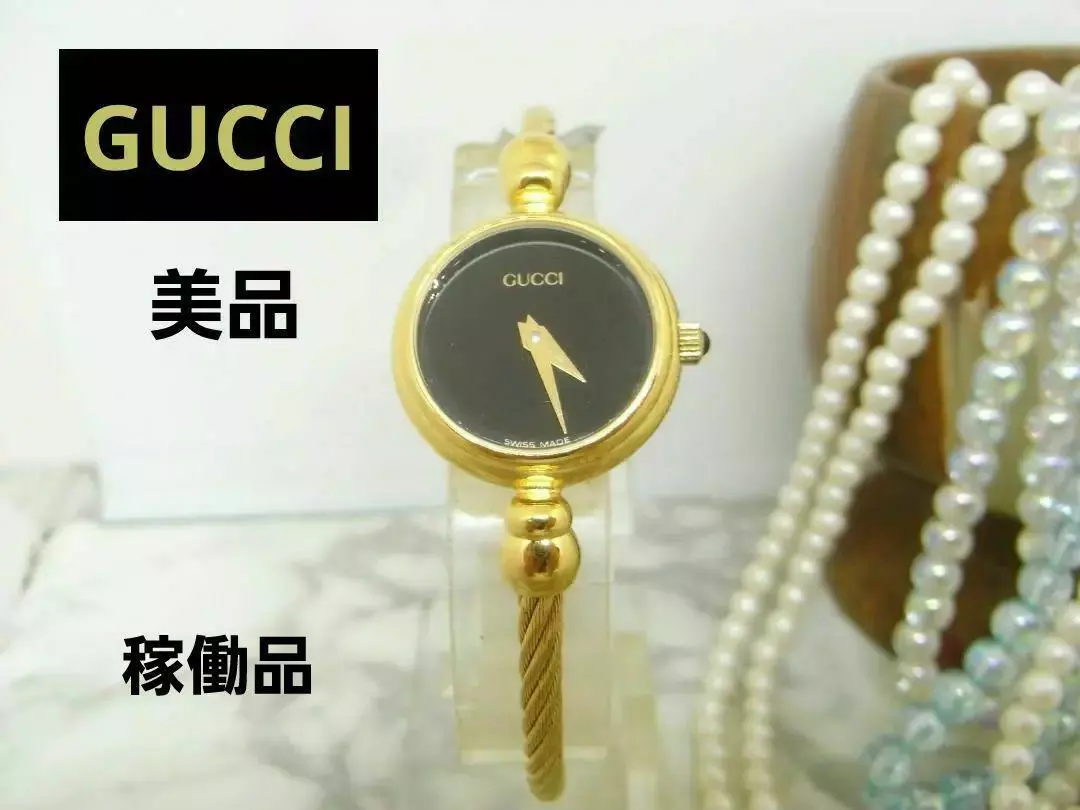 Montre GUCCI 2700 cadran noir fil doré design ceinture vintage femme occasion 2 aiguilles