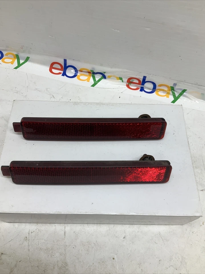 08-13 Cadillac CTS, GMC Acadia, Saturn Vue, Pontiac parachoques trasero cubierta reflector Foto 2 de 4