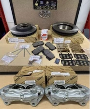 2003-2007 LEXUS LX470 FRONT BRAKE CALIPERS, ROTORS, TCMC PADS AND OEM SHIMS