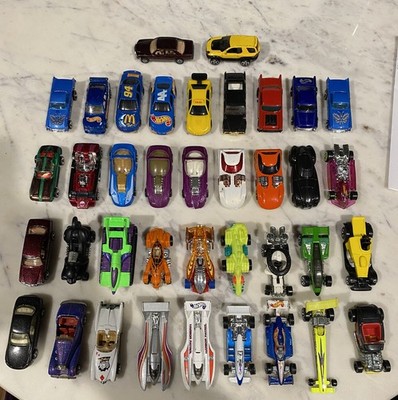 1990s Hot Wheels Diecast Mixed Collection. 2 cars with rare wheel combos. 