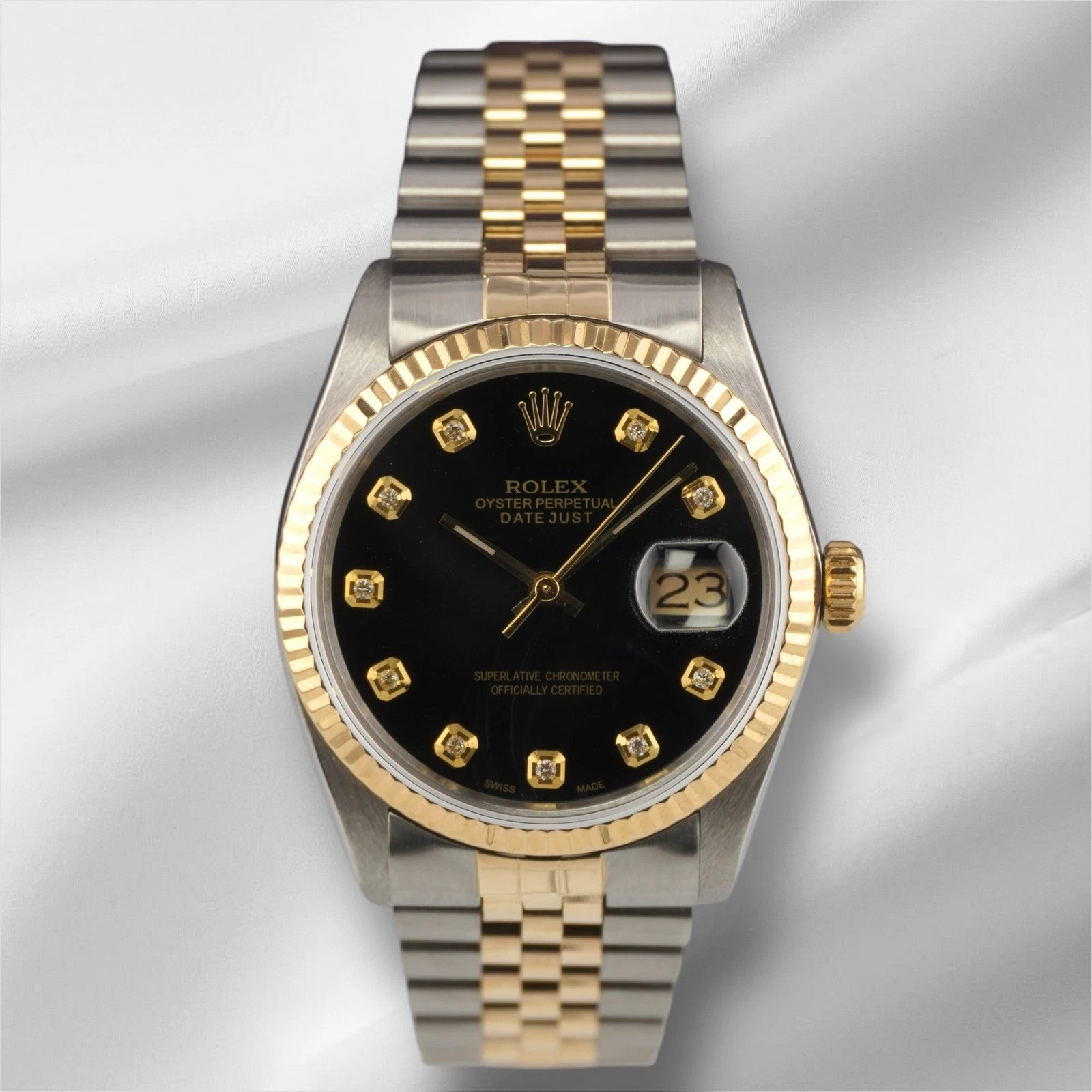 Rolex — Rolex Datejust 36mm Yellow Gold Fluted Black Diamond Dial Jubilee Watch