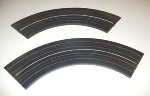 AURORA MODEL MOTORING- - #1519 - 9" RADIUS 1/4 CURVE SECTION- W/PINS - L217