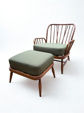 Ercol Jubilee armchair and model 205 footstool with olive green upholstery