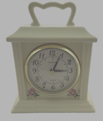 VINTAGE INGRAHAM PORCELAIN MANTLE QUARTZ CLOCK, IVORY COLORED WITH ROSES