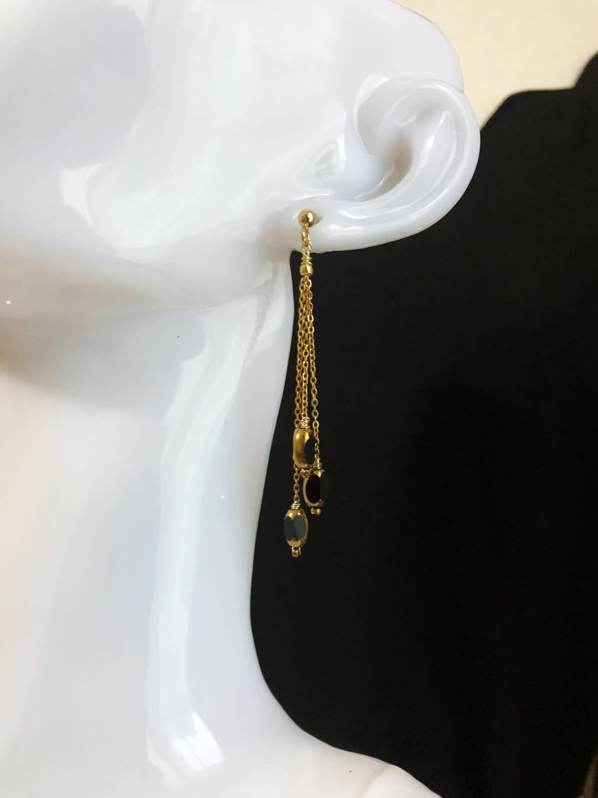 Collier à franges et boucles Perles d'olive pour vos soirées chic