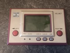 ebay® Auktion 127852124265 | Nintendo Game & Watch Konsole | Helmet | Gold Serie | CN-07 Thumbnail of ebay® auction 127852124265 | Nintendo Game & Watch Konsole | Helmet | Gold Serie | CN-07