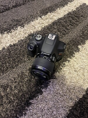 Canon EOS Rebel T7 with 128 and 16gb SD memory charger tripod and strap included