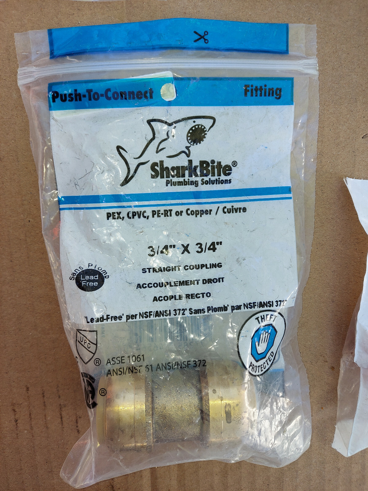 21VV09 ASSORTED PLUMBING HARDWARE: SHARK BITE, HOSE BARBS, STRAPS