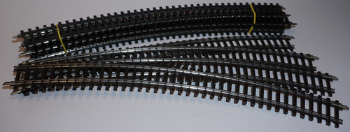 10 Rails Courbes Märklin 15° R=553.9 Mm Voie K HO - Occasion Comme Neuf, Pour Train Miniature