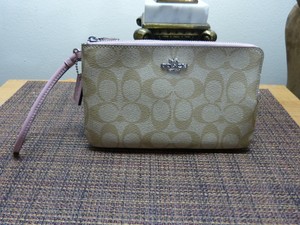 coach double zip wallet in signature canvas