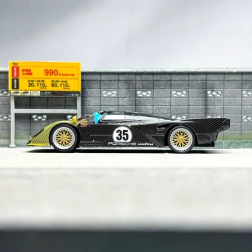 Spark 1:64 Porsche 962 auto display edizione limitata rivestimento mimetico modello in lega - Foto 5 di 8