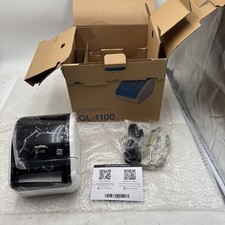 Impresora de etiquetas Brother QL-1100 caja abierta cable de alimentación de CA y cable USB