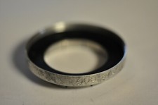 Argus 31.5mm push on adapter ring. No retaining ring.