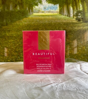 Beautiful 100ml EDP spray by Ester Lauder (company sealed )