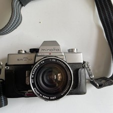 Minolta SRT-101 35mm SLR Film Camera W/ lens,strap, and case