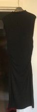 H&M black body con ruched dress. Size L.High neck. Mid calf length.