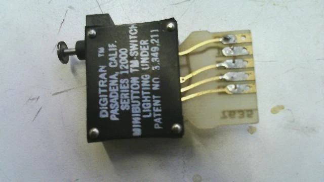 Mini interruptor pulsador octal unidireccional serie Digitran 12000 Foto 2 de 2