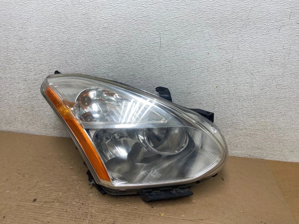 Faro HID de xenón para pasajero derecho Nissan Rogue 2009-2013 OEM Q9163 DW Foto 2 de 4