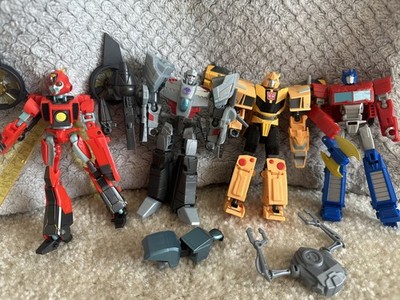 transformers toys lot of 4 earthspark optimus prime, megatron, bumblebee, twitch