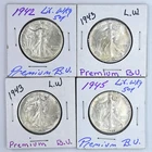 Lot of Four Walking Liberty Half Dollars - 1942, (2) 1943, and 1945