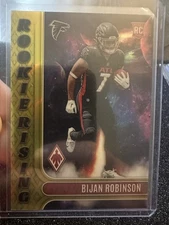 2023 Panini Phoenix - Rookie Rising Bijan Robinson Yellow 7/75 jersey/ # match 