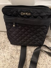 Quilted crossbody bag with an adjustable strap and gold-tone hardware
