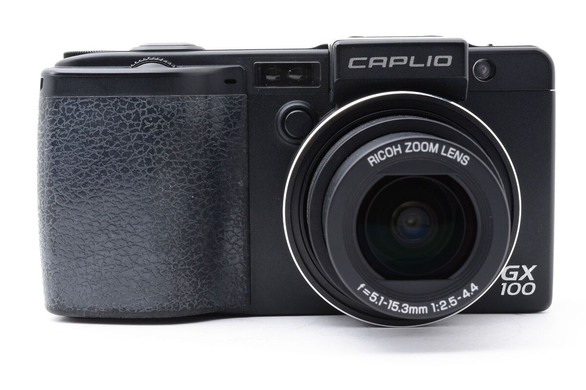 RICOH Caplio GX100 10.0MP Digital Camera Black w/VF-1 RICOH Caplio GX100 10.0MP Digital Camera Black w/VF-1
