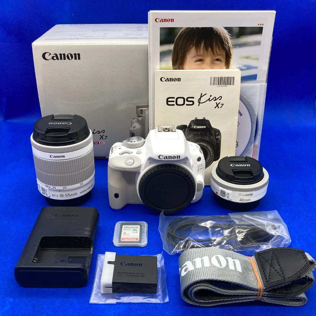 Good condition Canon EOS Kiss X7 Digital SLR camera White Double 