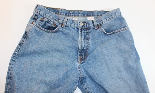 Blue VTG Lucky Brand jeans, 34x30, medium wash, brown paint splatter on right leg, USA made.