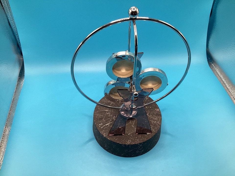 Revolving Gadget Perpetual Motion Desk Office Art Decor Toy