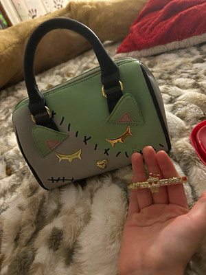 Betsey Johnson frankencat bag and Betsy skull bangle sold together
