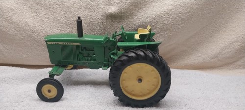 1/16 scale John Deere Ertl 3020 tractor. wide front wide rear wheels. No box