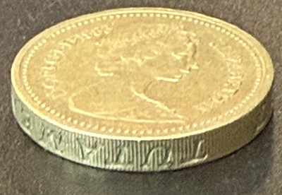1983 Queen Elizabeth II One Pound coin upside-down rim error first