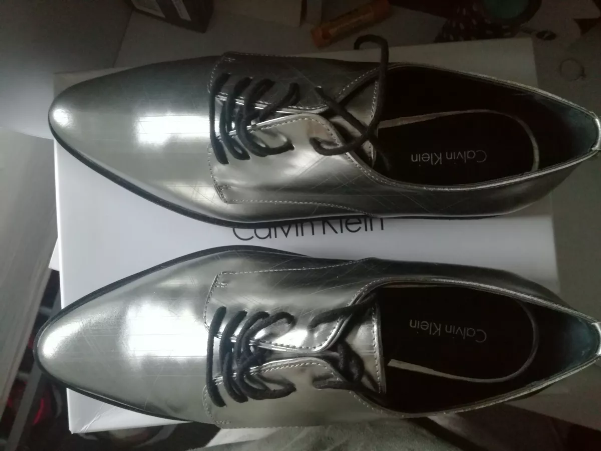 Silver calvin klein shoes deals