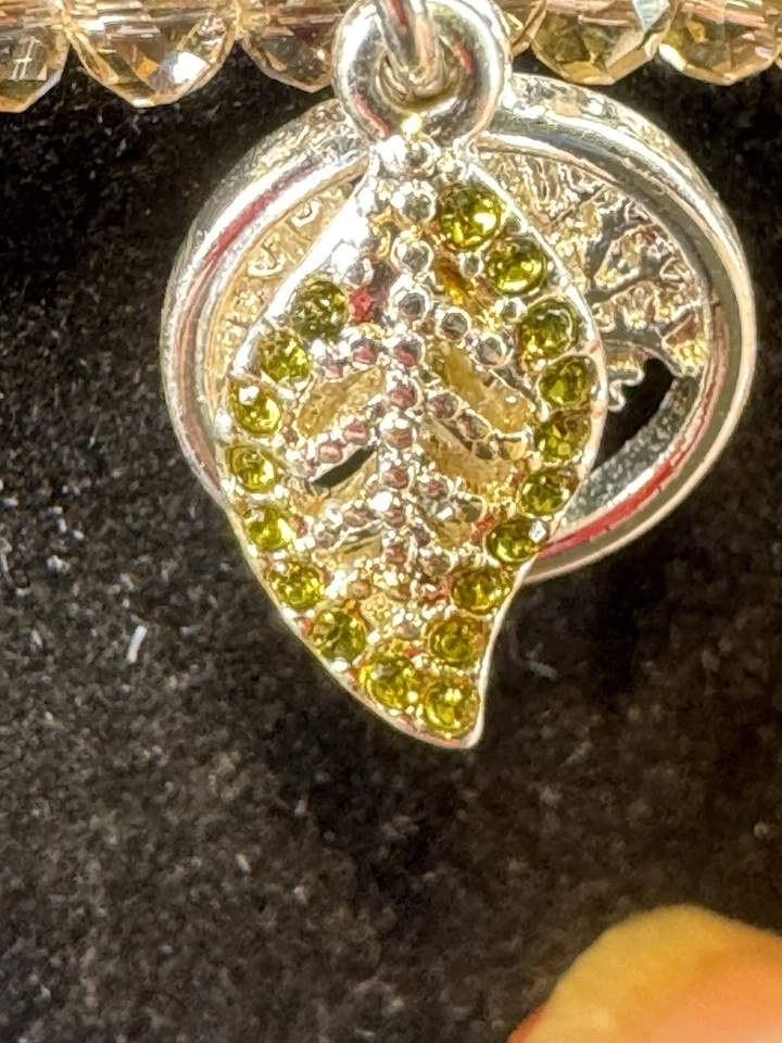 Pulsera Vera Bradley Mark Nuevos Comienzos Tono Plata y Cristal Rosa Envolvente Hoja Foto 2 de 4