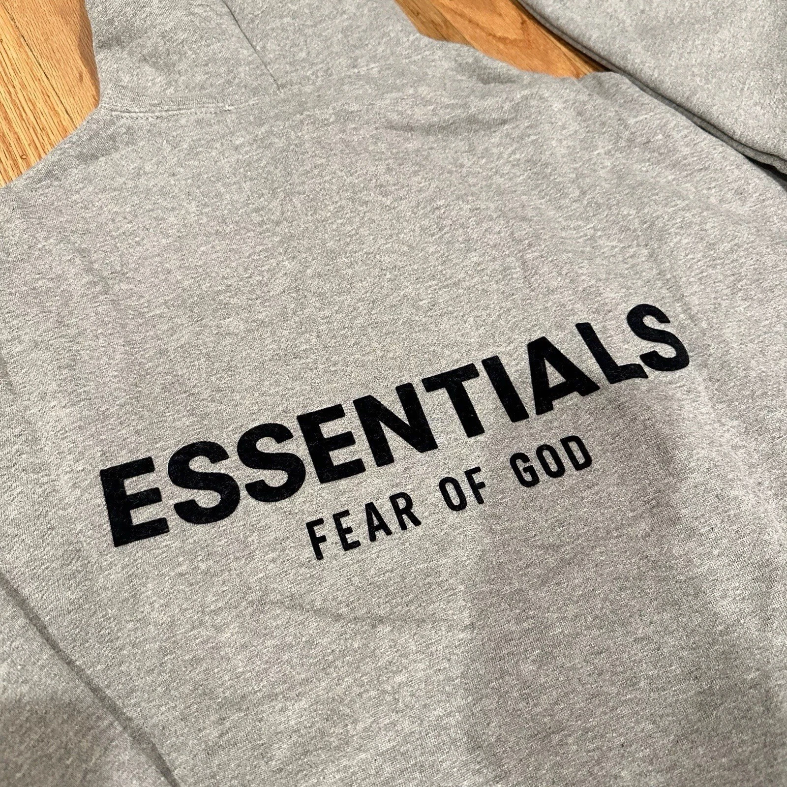Felpa con cappuccio grigia Fear of God Essentials S XL